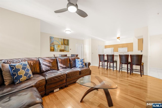 2112 Schindler Ln, Wayne, NJ 07470 - living room featuring light wood-type flooring and ceiling fan