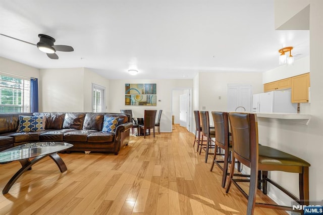 2112 Schindler Ln, Wayne, NJ 07470 - living area featuring light wood-style flooring and ceiling fan