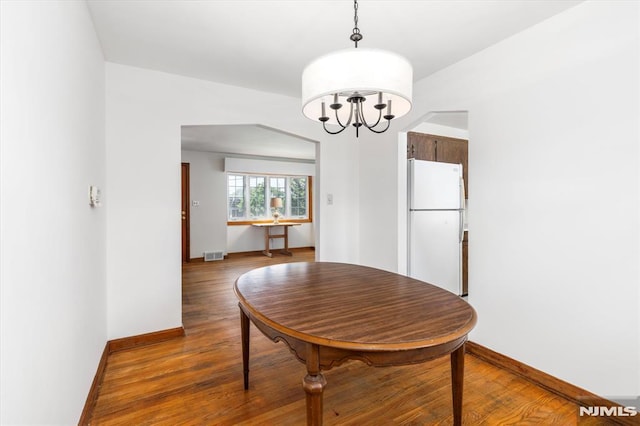 459 Washington Ave, Rutherford, NJ 07070 - dining space featuring a chandelier and wood finished floors