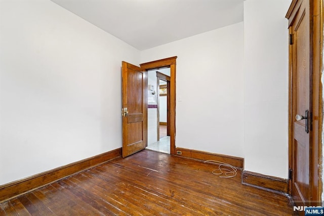 174-176 Albion Ave, Paterson, NJ 07502 - empty room with baseboards and dark wood finished floors