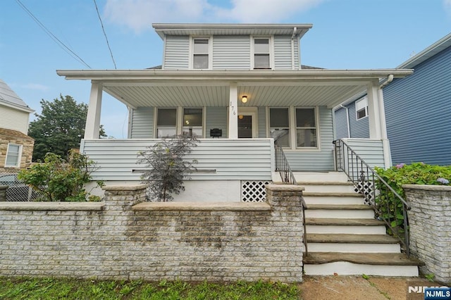174-176 Albion Ave, Paterson, NJ 07502 - view of front of property featuring a porch