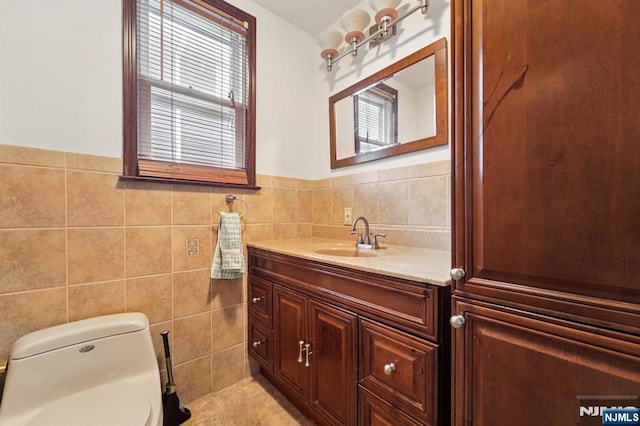 174-176 Albion Ave, Paterson, NJ 07502 - bathroom featuring tile walls and vanity