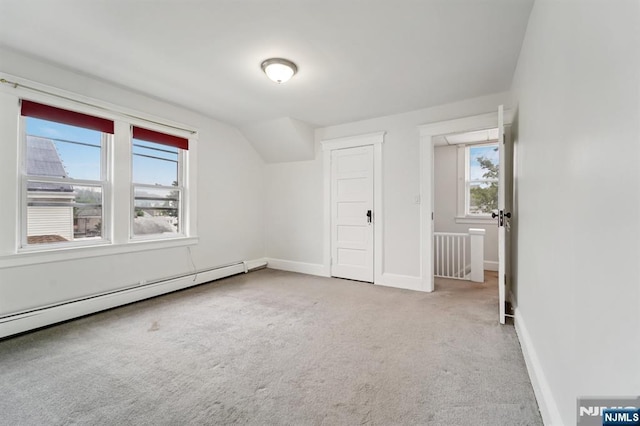 174-176 Albion Ave, Paterson, NJ 07502 - additional living space featuring carpet floors, plenty of natural light, and a baseboard heating unit