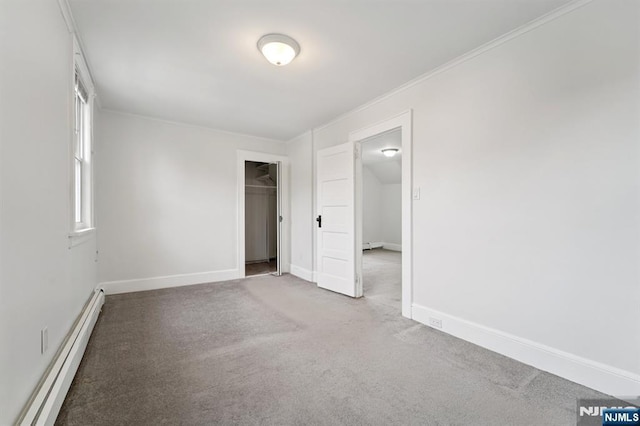 174-176 Albion Ave, Paterson, NJ 07502 - unfurnished bedroom with baseboard heating, carpet flooring, a closet, and crown molding