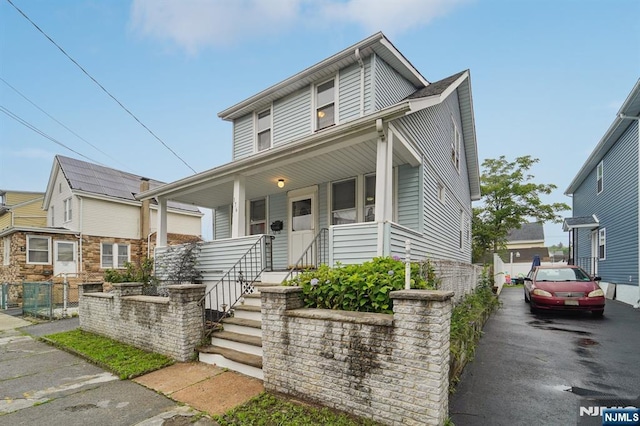 174-176 Albion Ave, Paterson, NJ 07502 - view of front of house with covered porch