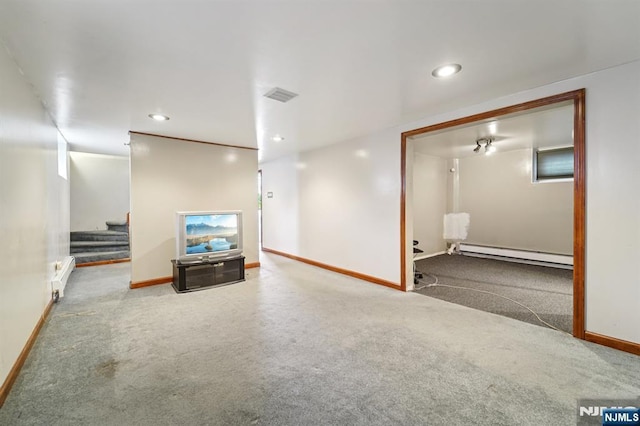 174-176 Albion Ave, Paterson, NJ 07502 - unfurnished living room featuring a baseboard radiator, carpet flooring, stairs, and recessed lighting