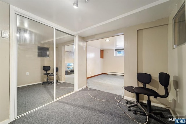 174-176 Albion Ave, Paterson, NJ 07502 - exercise area with baseboard heating and carpet