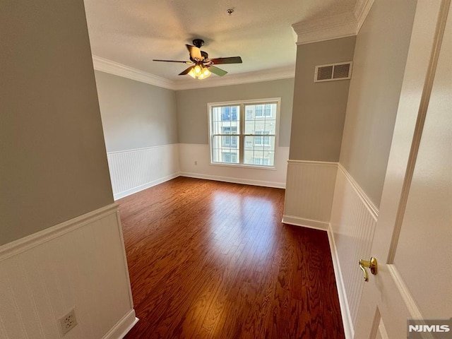 7207 Ravenscroft Rd Unit 7207, Clifton, NJ 07013 - spare room featuring wainscoting, crown molding, ceiling fan, dark wood finished floors, and a pendent fire sprinkler