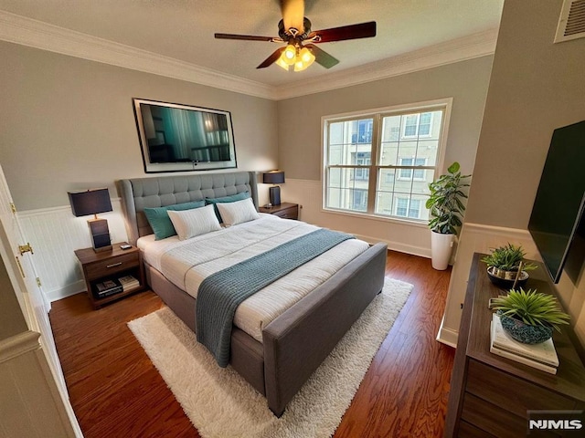 7207 Ravenscroft Rd Unit 7207, Clifton, NJ 07013 - bedroom featuring wood finished floors, a wainscoted wall, crown molding, and a ceiling fan
