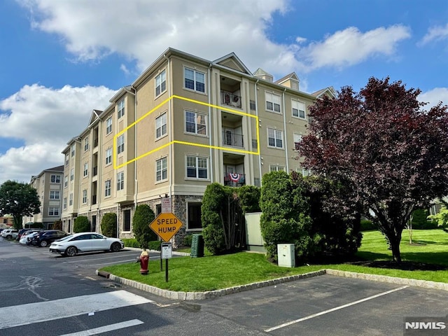 7207 Ravenscroft Rd Unit 7207, Clifton, NJ 07013 - view of apartment building / complex featuring uncovered parking