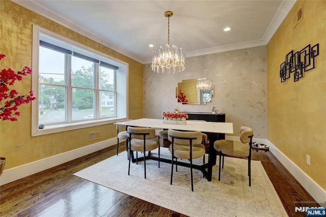 62 Merritt Ave, Cresskill, NJ 07626 - dining room with dark wood finished floors, a chandelier, crown molding, and recessed lighting