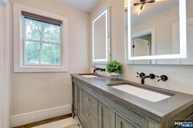 62 Merritt Ave, Cresskill, NJ 07626 - full bath with double vanity, ceiling fan, and tile patterned floors