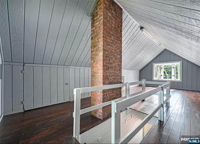 126 Grant Ave, Cresskill, NJ 07626 - bonus room with wood walls, hardwood / wood-style flooring, and vaulted ceiling