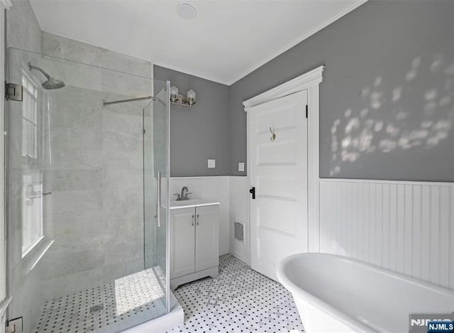 126 Grant Ave, Cresskill, NJ 07626 - full bath with a stall shower, wainscoting, a freestanding bath, vanity, and ornamental molding