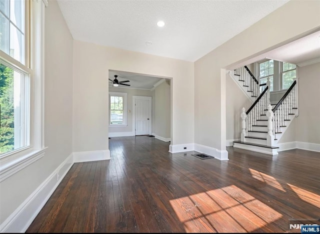 126 Grant Ave, Cresskill, NJ 07626 - spare room featuring hardwood / wood-style floors, stairs, a ceiling fan, and a textured ceiling