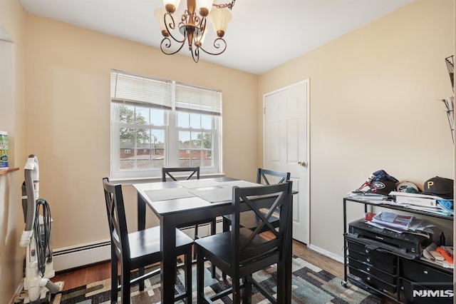 1245 Valley Rd Unit B, Wayne, NJ 07470 - dining space with a chandelier and wood finished floors