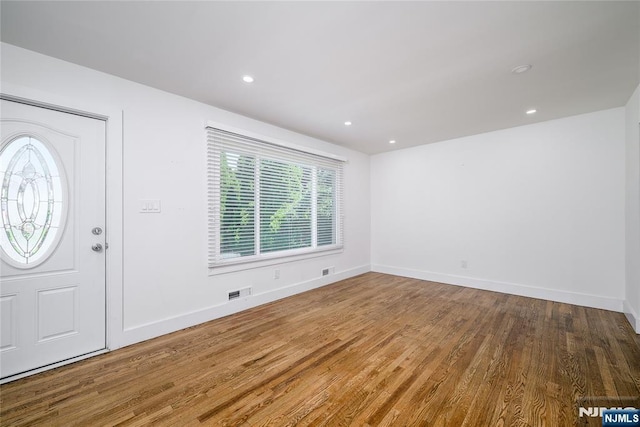 69 Lorraine Dr, Clifton, NJ 07012 - foyer entrance with wood finished floors and recessed lighting