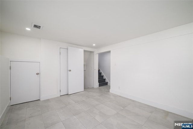 69 Lorraine Dr, Clifton, NJ 07012 - spare room featuring stairs and recessed lighting