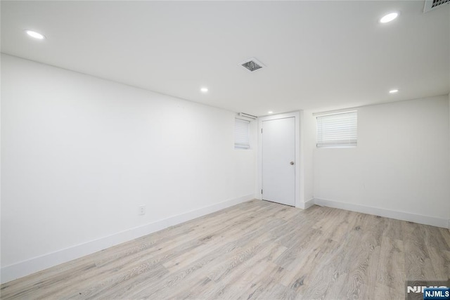 69 Lorraine Dr, Clifton, NJ 07012 - below grade area with light wood finished floors and recessed lighting