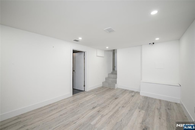 69 Lorraine Dr, Clifton, NJ 07012 - finished basement featuring light wood finished floors, recessed lighting, and stairway