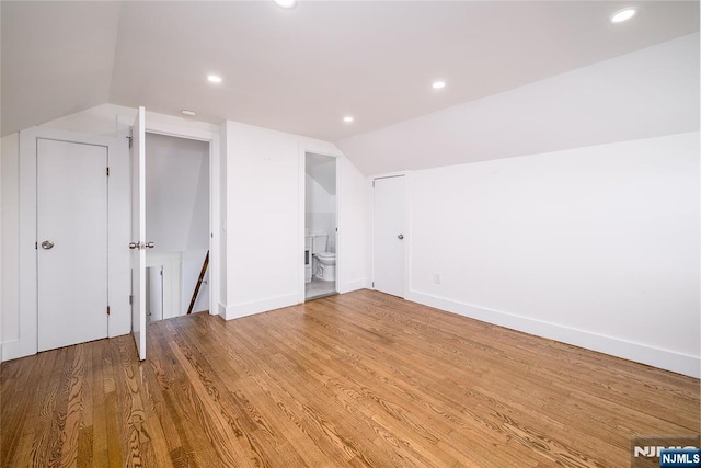 69 Lorraine Dr, Clifton, NJ 07012 - additional living space with lofted ceiling, recessed lighting, and light wood-type flooring