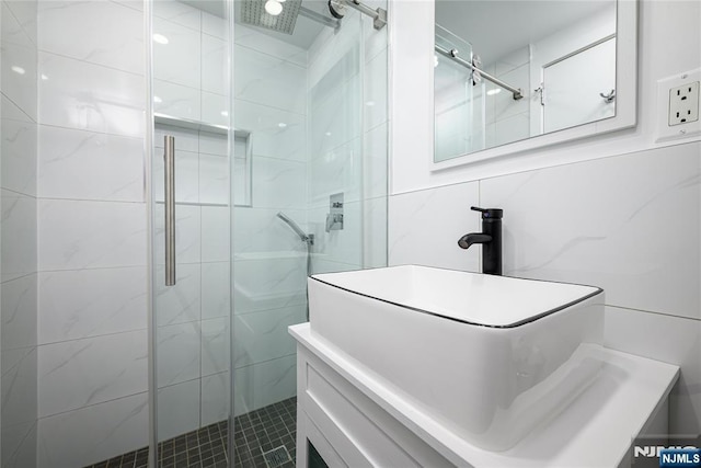 69 Lorraine Dr, Clifton, NJ 07012 - full bathroom with a shower stall, tile walls, and vanity
