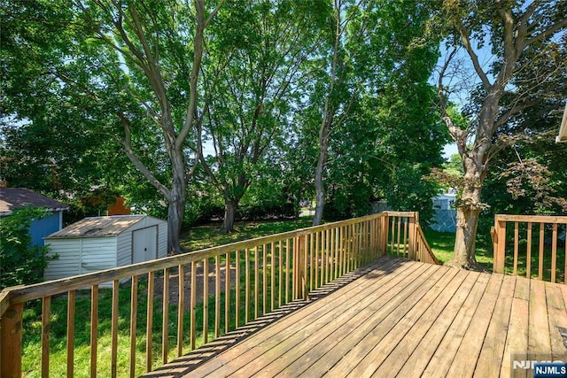 69 Lorraine Dr, Clifton, NJ 07012 - deck featuring a storage unit and a yard
