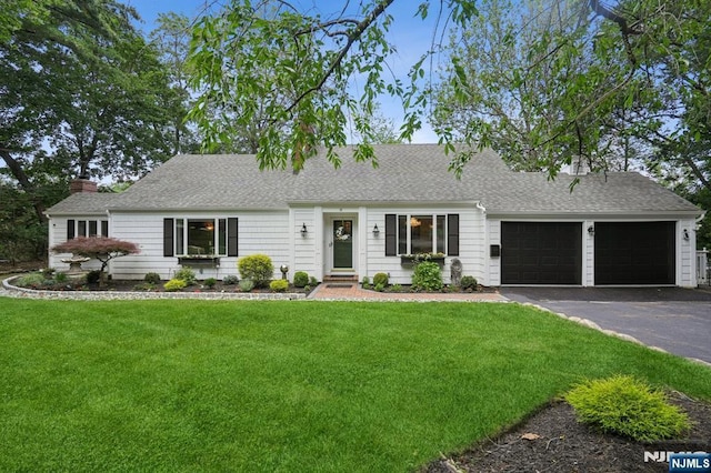 15 Barberry Way, Essex Fells, NJ 07021 - view of front of house featuring a garage, driveway, a front lawn, a chimney, and a shingled roof