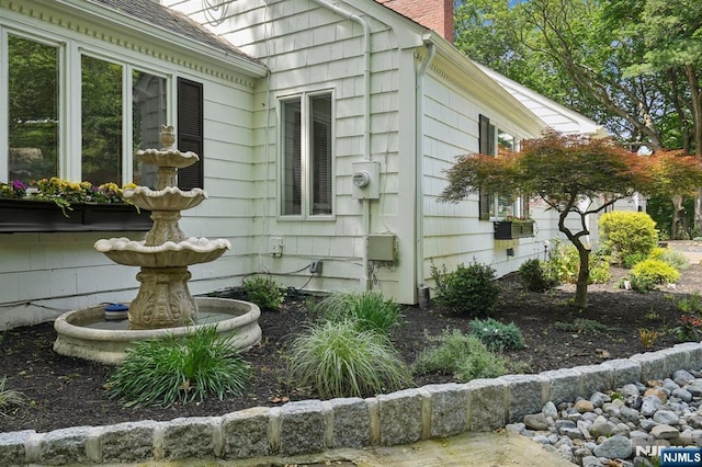 15 Barberry Way, Essex Fells, NJ 07021 - view of side of home with a chimney