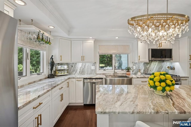 15 Barberry Way, Essex Fells, NJ 07021 - kitchen with appliances with stainless steel finishes, plenty of natural light, light stone countertops, ornamental molding, and recessed lighting