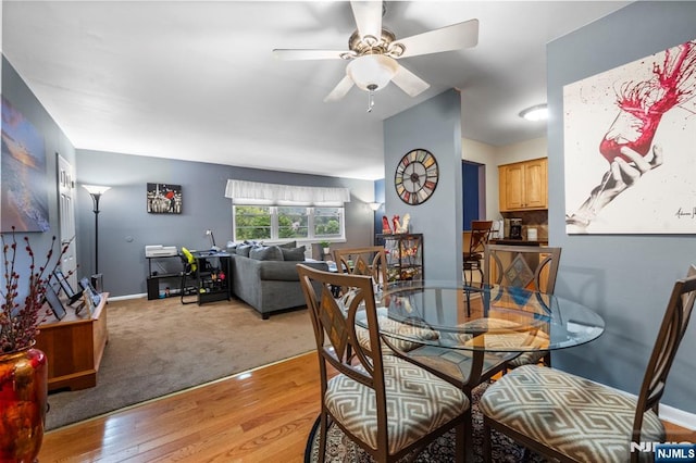141 N Maple Ave Unit 141, Park Ridge, NJ 07656 - dining space with a ceiling fan and light wood-type flooring