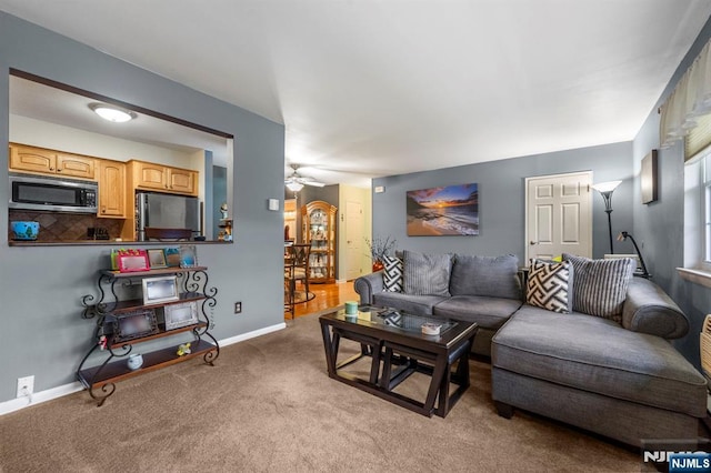 141 N Maple Ave Unit 141, Park Ridge, NJ 07656 - living room featuring a ceiling fan and light colored carpet