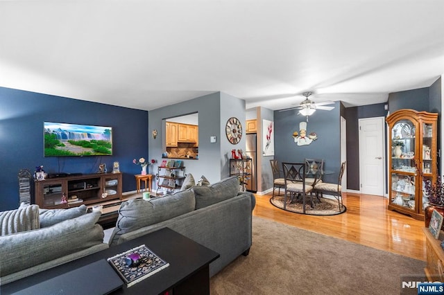 141 N Maple Ave Unit 141, Park Ridge, NJ 07656 - living area featuring ceiling fan, light wood-type flooring, and light colored carpet