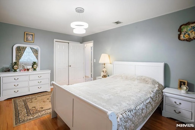 131 Shaler Ave, Fairview, NJ 07022 - bedroom featuring wood finished floors and a closet