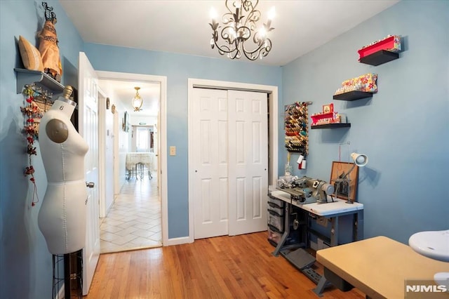 131 Shaler Ave, Fairview, NJ 07022 - office area featuring a chandelier and light wood-style floors