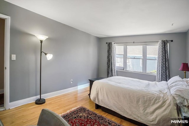 131 Shaler Ave, Fairview, NJ 07022 - bedroom featuring light wood-style flooring and baseboards