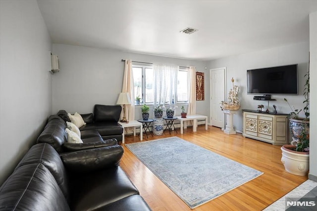131 Shaler Ave, Fairview, NJ 07022 - living room featuring light wood finished floors