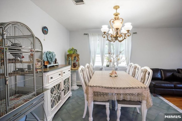 131 Shaler Ave, Fairview, NJ 07022 - dining room with a chandelier
