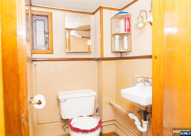 5 Grove St, Bloomfield, NJ 07003 - half bathroom featuring tile walls and wainscoting