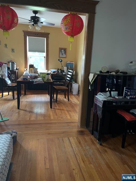 114 Hillside Ave, Teaneck, NJ 07666 - dining space with ceiling fan and light wood-style floors