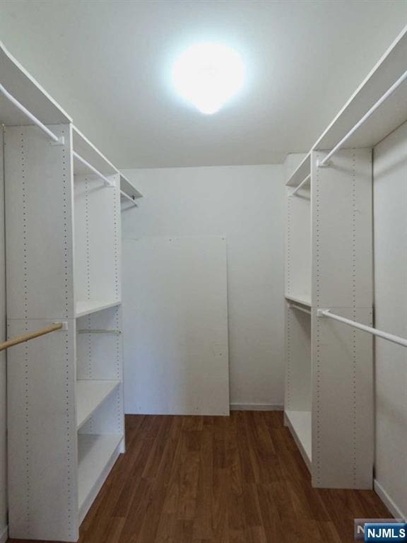 380 Whimbrel Ln Unit 380, Secaucus, NJ 07094 - walk in closet featuring wood finished floors