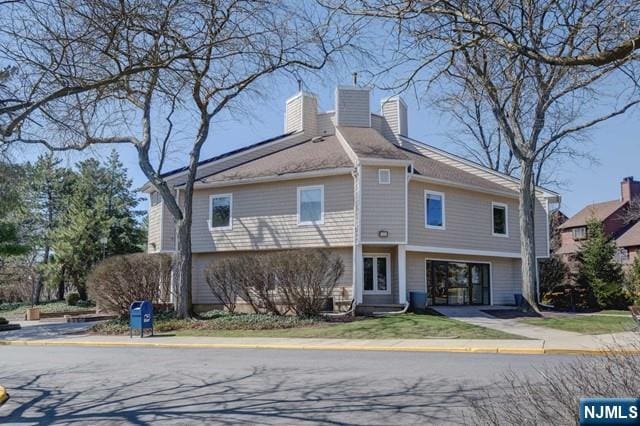 380 Whimbrel Ln Unit 380, Secaucus, NJ 07094 - back of house with a chimney