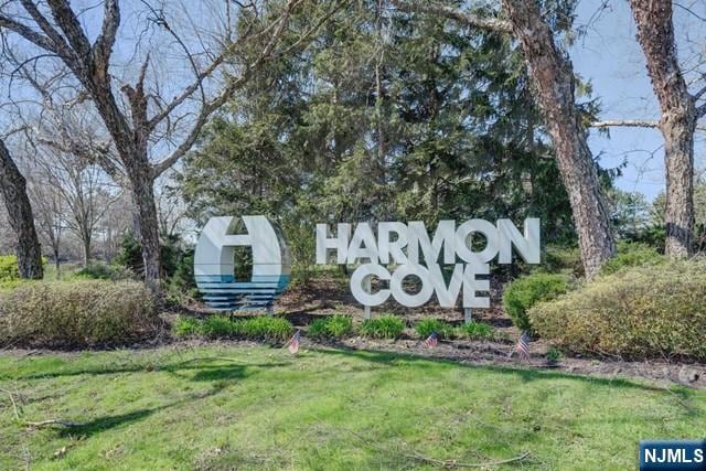 380 Whimbrel Ln Unit 380, Secaucus, NJ 07094 - community / neighborhood sign with a lawn