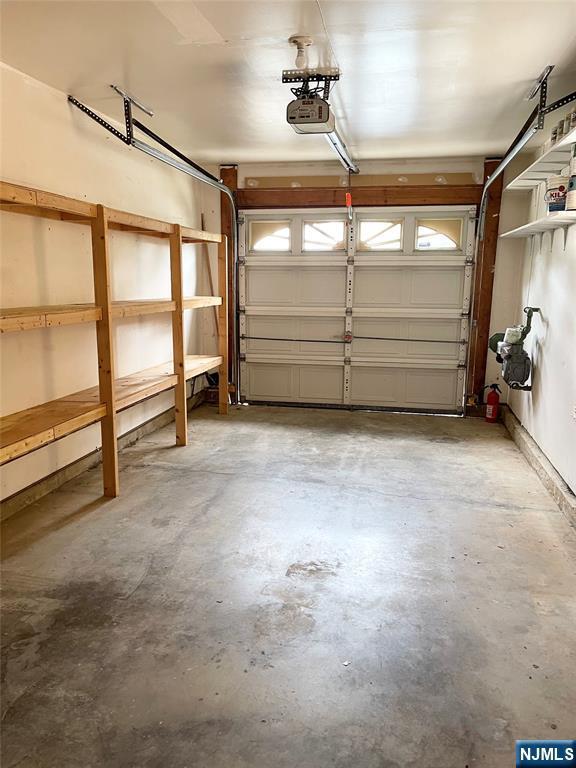 214 Manahan Rd Unit 214, East Brunswick, NJ 08816 - garage with a garage door opener