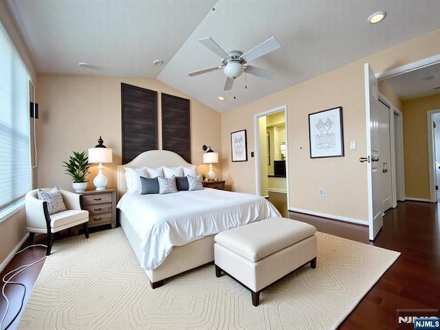 214 Manahan Rd Unit 214, East Brunswick, NJ 08816 - bedroom with wood finished floors, vaulted ceiling, connected bathroom, and a ceiling fan
