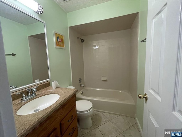 214 Manahan Rd Unit 214, East Brunswick, NJ 08816 - full bathroom with tile patterned flooring, vanity,  shower combination, and a textured ceiling