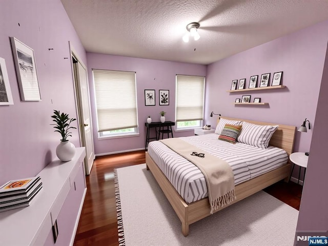214 Manahan Rd Unit 214, East Brunswick, NJ 08816 - bedroom featuring wood finished floors and a textured ceiling