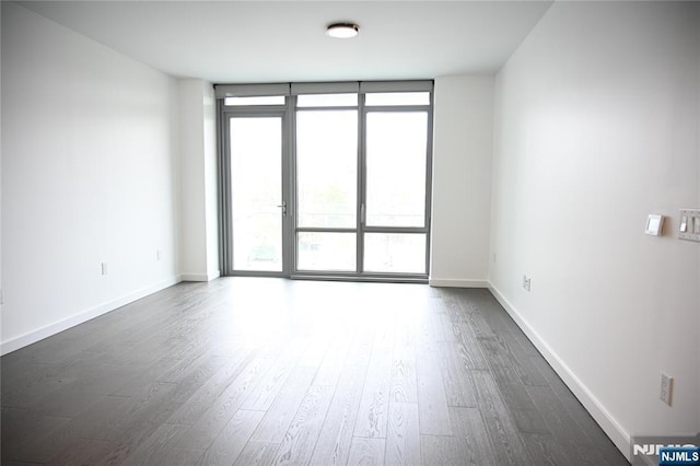 320 Adolphus Ave Unit 422, Cliffside Park, NJ 07010 - empty room featuring dark wood-style flooring and floor to ceiling windows