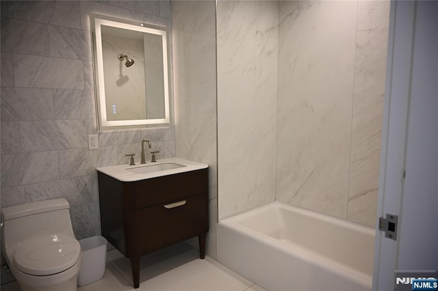 320 Adolphus Ave Unit 422, Cliffside Park, NJ 07010 - bathroom with tile walls, vanity, and tub / shower combination
