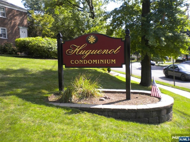 100 Huguenot Ave Unit 1B, Englewood, NJ 07631 - community sign with a lawn